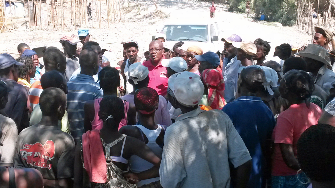 HHI-H's Christophe Rodrigue Addressing the Crowd at Tetalo Refugee Camp-1